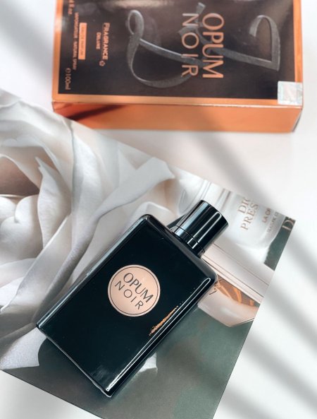عطر opum noir